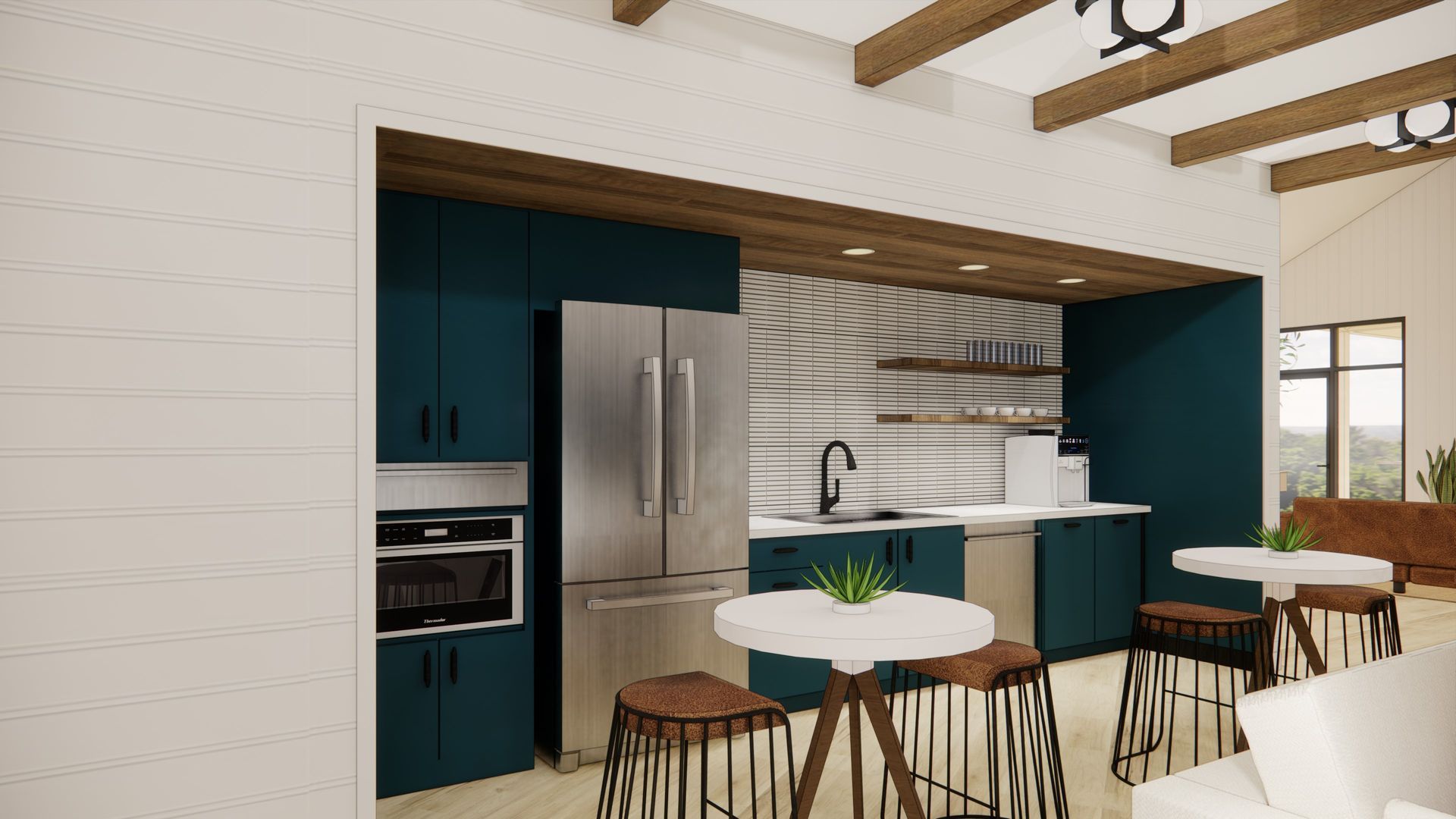 A kitchen with blue cabinets , stainless steel appliances , tables and stools.