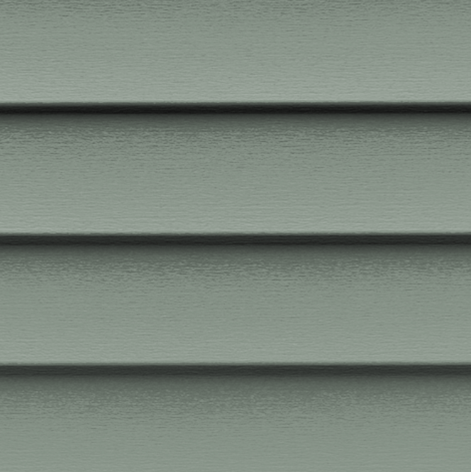 A close up of a green siding on a house.
