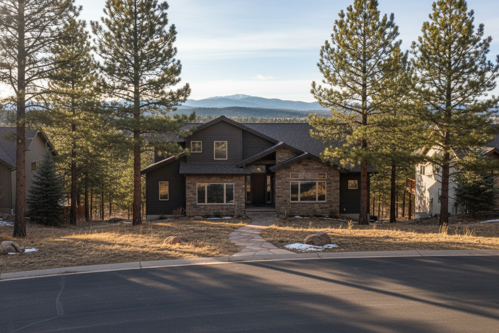 Professional installers leveling double hung windows during installation in Colorado mountain home