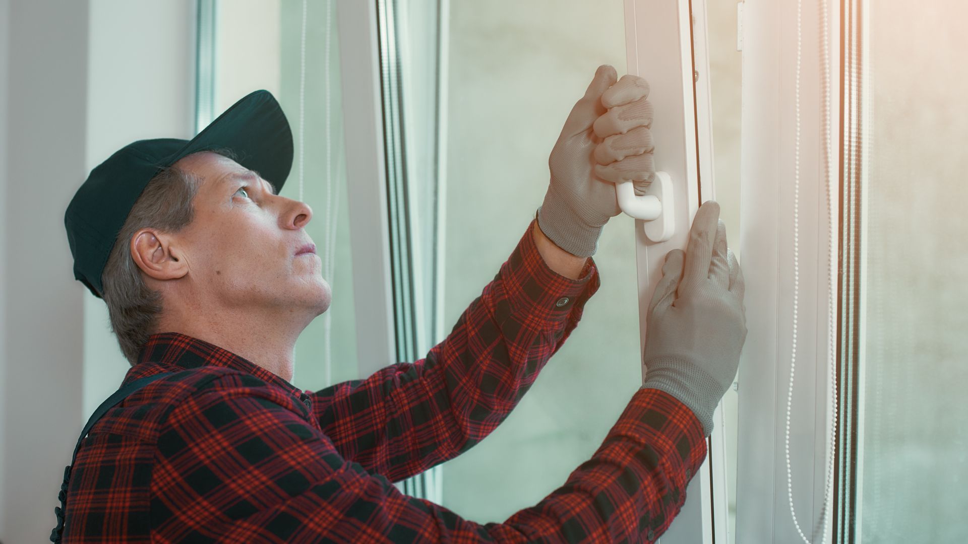 Denver window contractor explaining energy-efficient window options to homeowner
