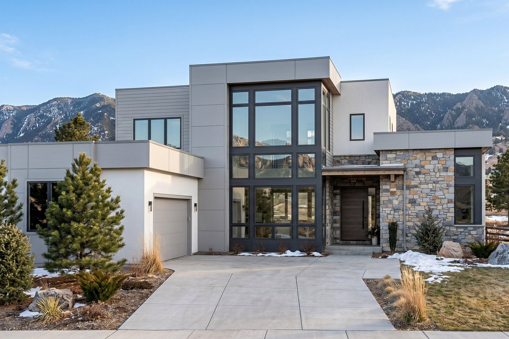 Professional installers leveling double hung windows during installation in Colorado mountain home