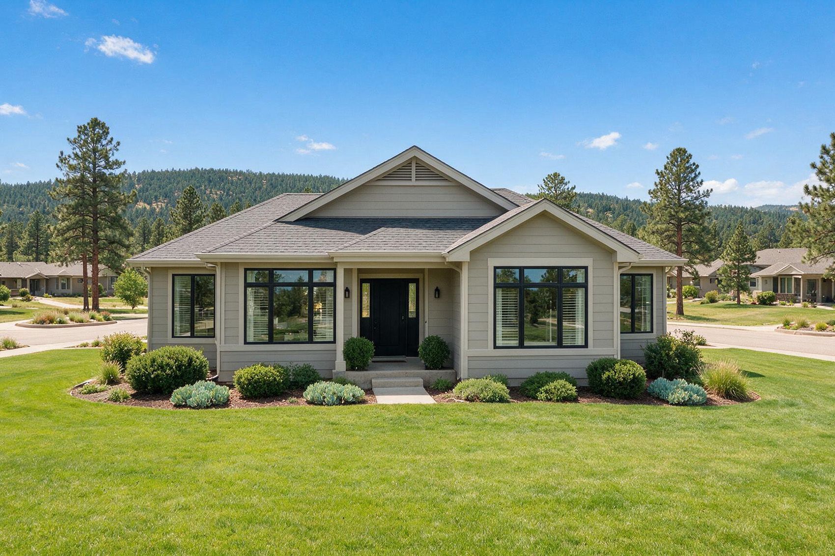 Professional installers leveling double hung windows during installation in Colorado mountain home