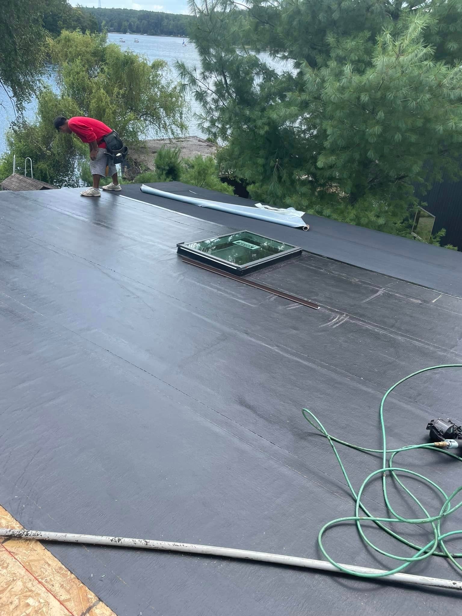 Man Repairing Roof | Wurtsboro, NY | Level 5 Renovations