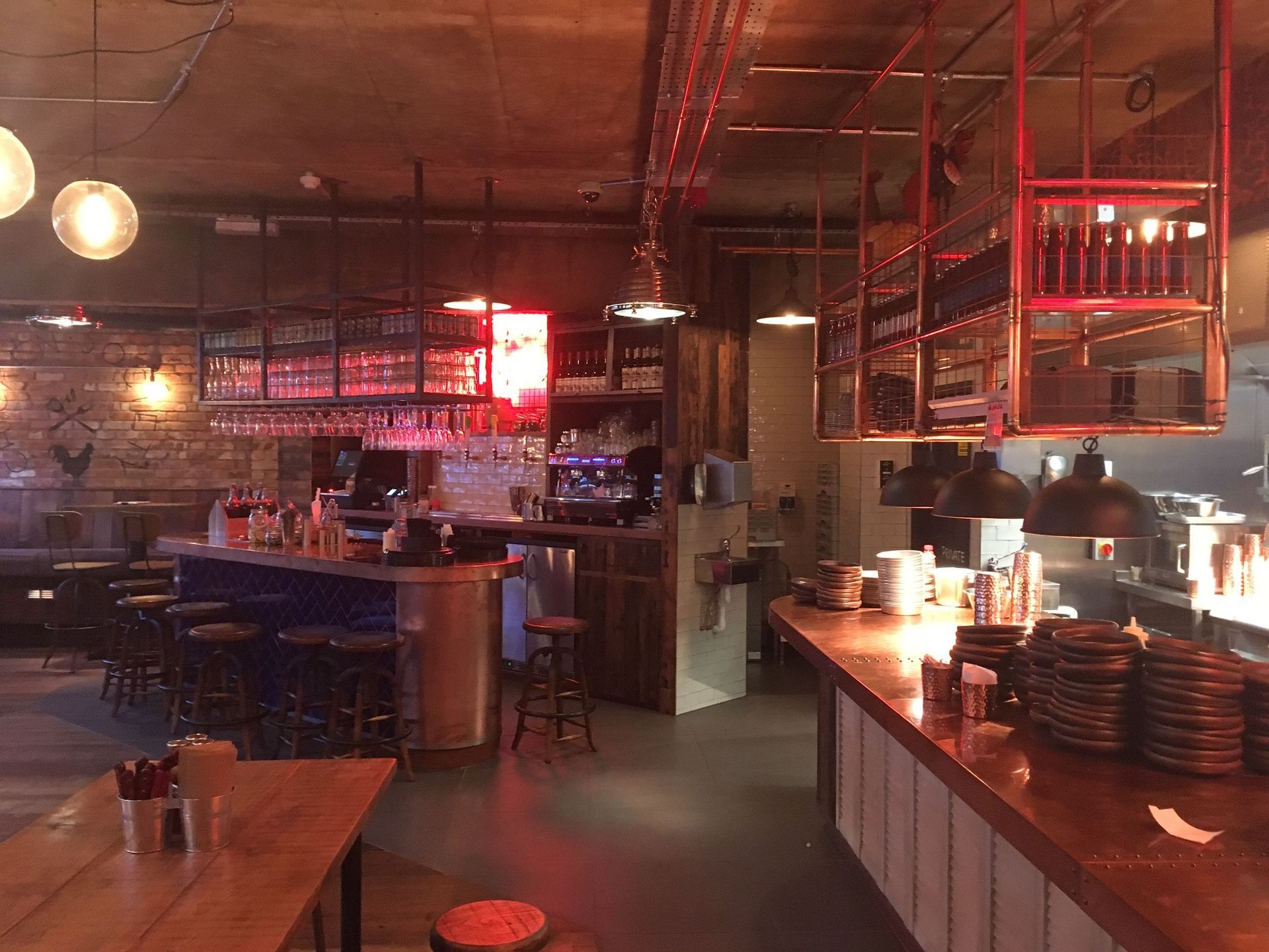 Chicken Society, Finchley, London, view along front of industrial design food servery counter.