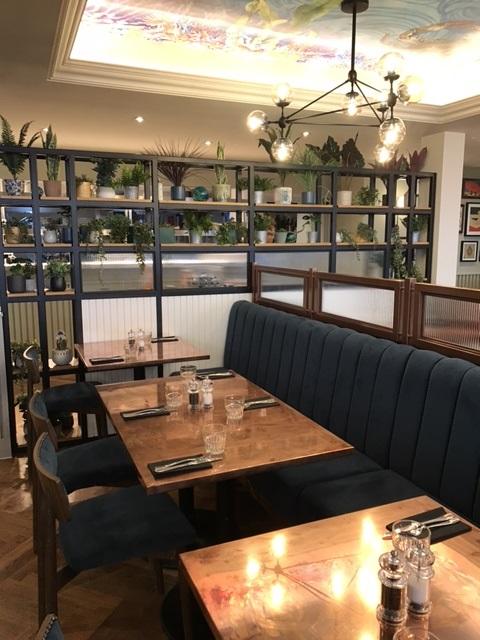 Oyster House, Mumbles, fixed seating area in front of bar, looking towards kitchen pass.