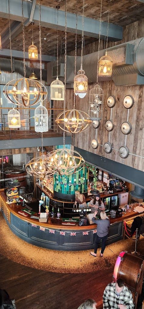 London Road Brew House, Southampton, view towards industrial lighting and birdcage feature lights.