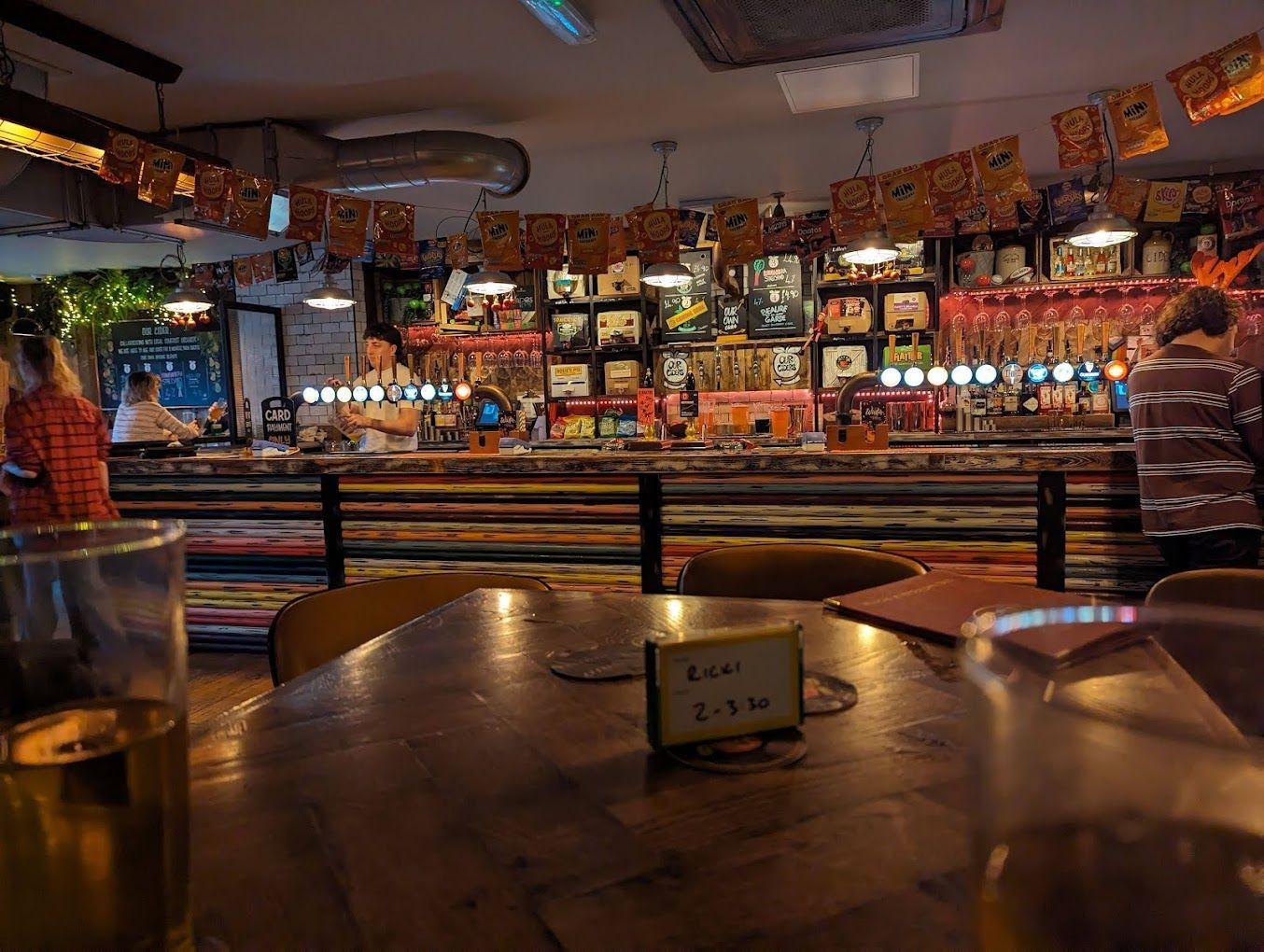 Bath Cider House, view towards bar counter with scaffold tube bar front and industrial design backfitting.