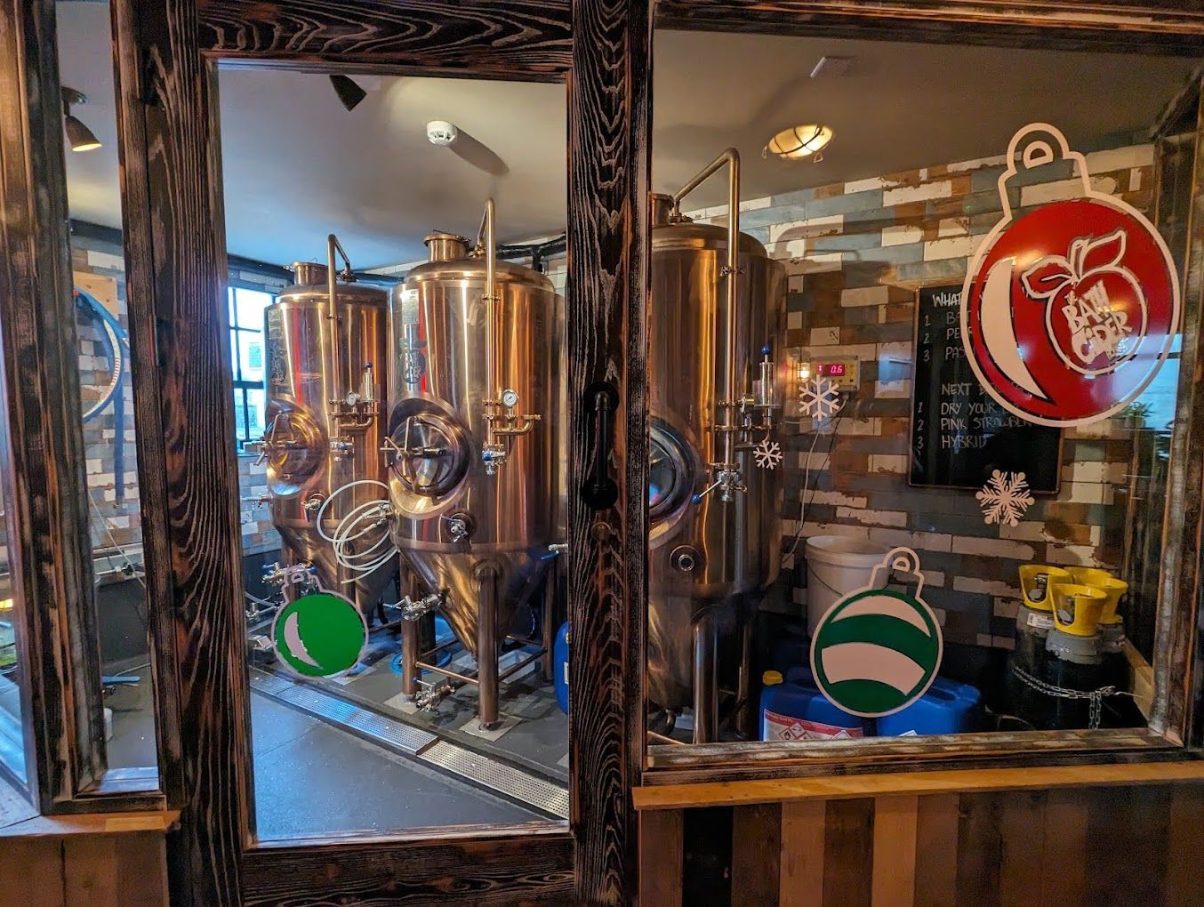 Bath Cider House, view showing on site cider brewing tanks to first floor brewing area.