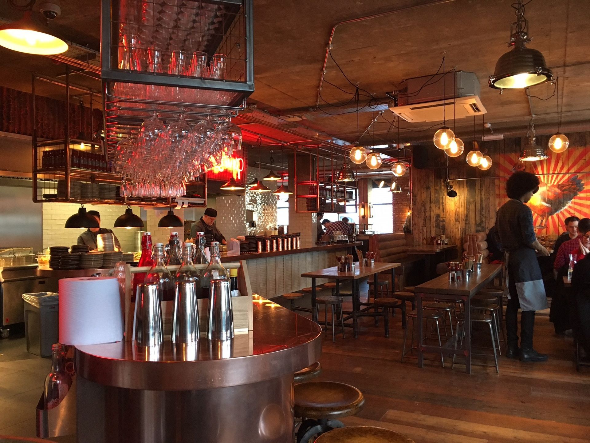 Chicken Society, Finchley, London, view from end of industrial style bar counter.