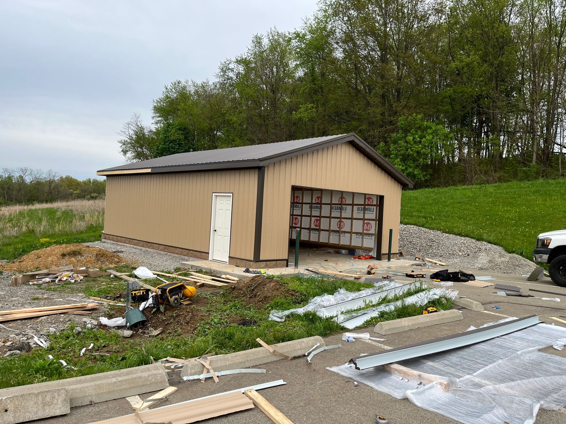 A garage is being built on the side of the road.