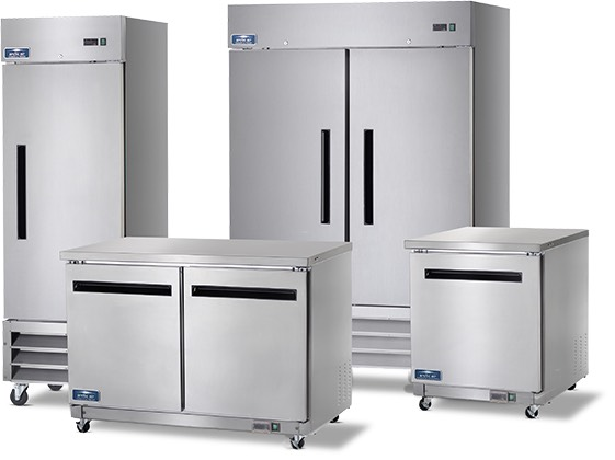 White wall-mounted air conditioner above a beige couch, beside a large window and potted palm.