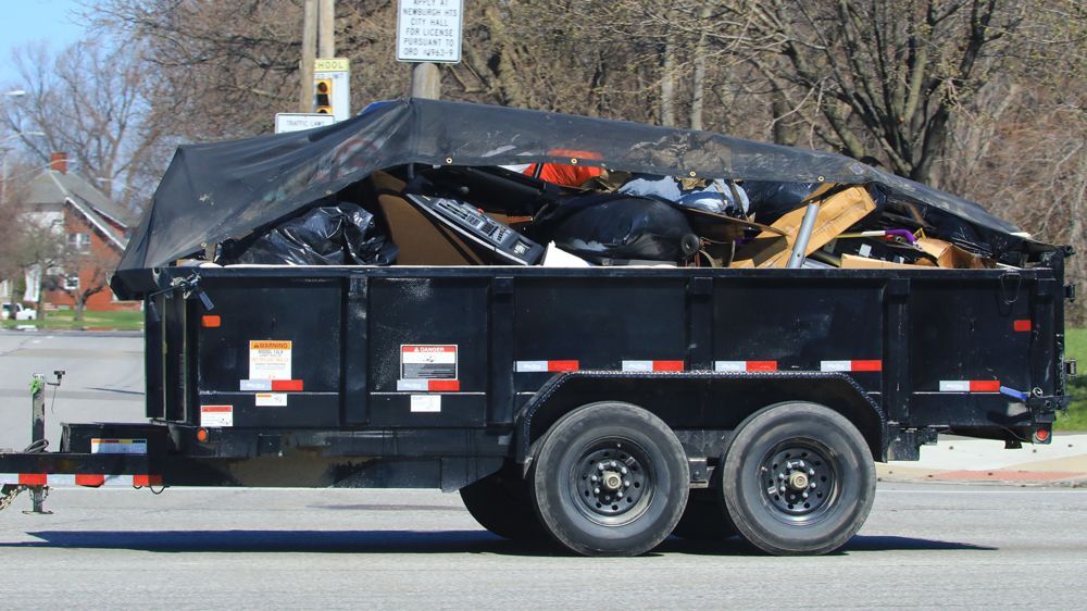 Black Trash Dumpsters — Gray, GA — Mid-State Roofing