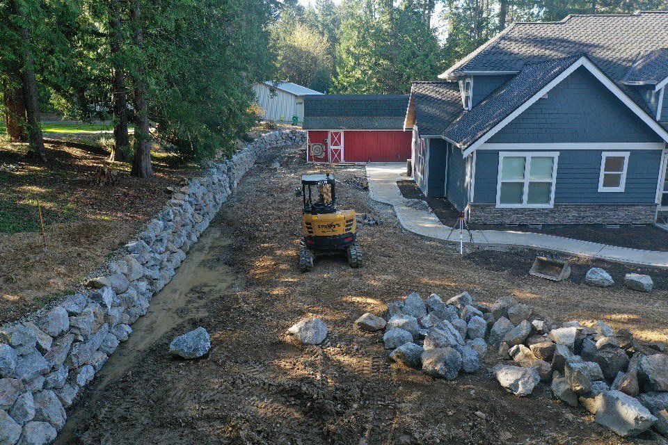 Truck Excavator Sideways — Snohomish, WA, — Smokey’s Tractor Werx & Excavation Inc.