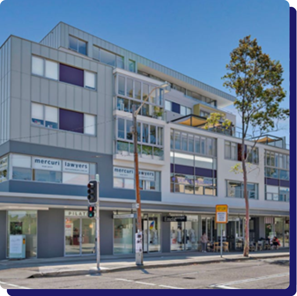 A building with a lot of windows and a sign that says ' mercure ' on it