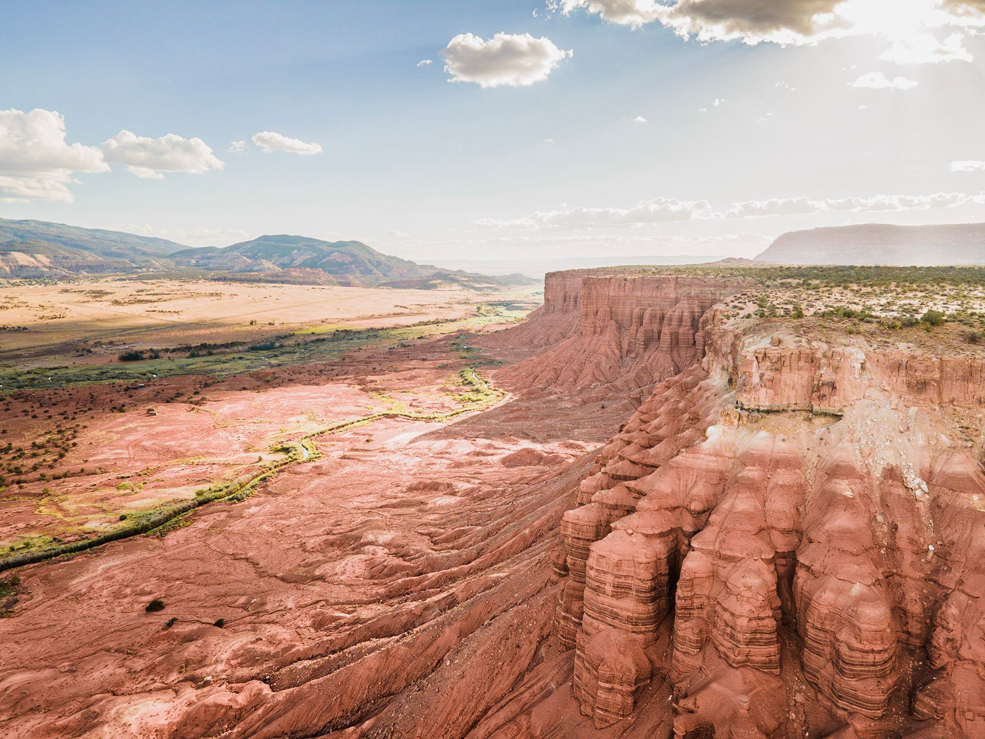 red rocks rising high above an open valley