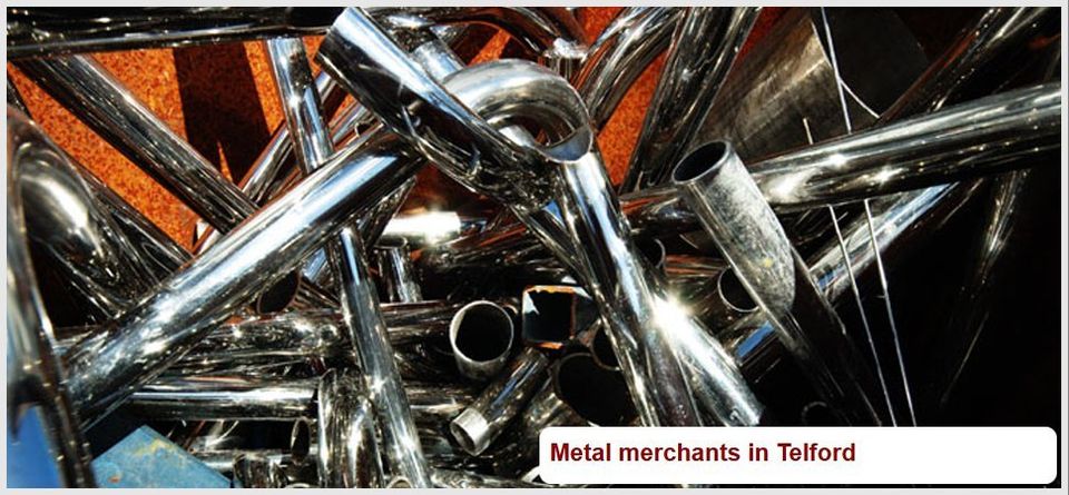 Piled of gleaming metal pipes