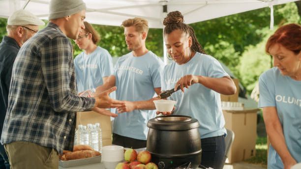 A group of volunteers serve food
