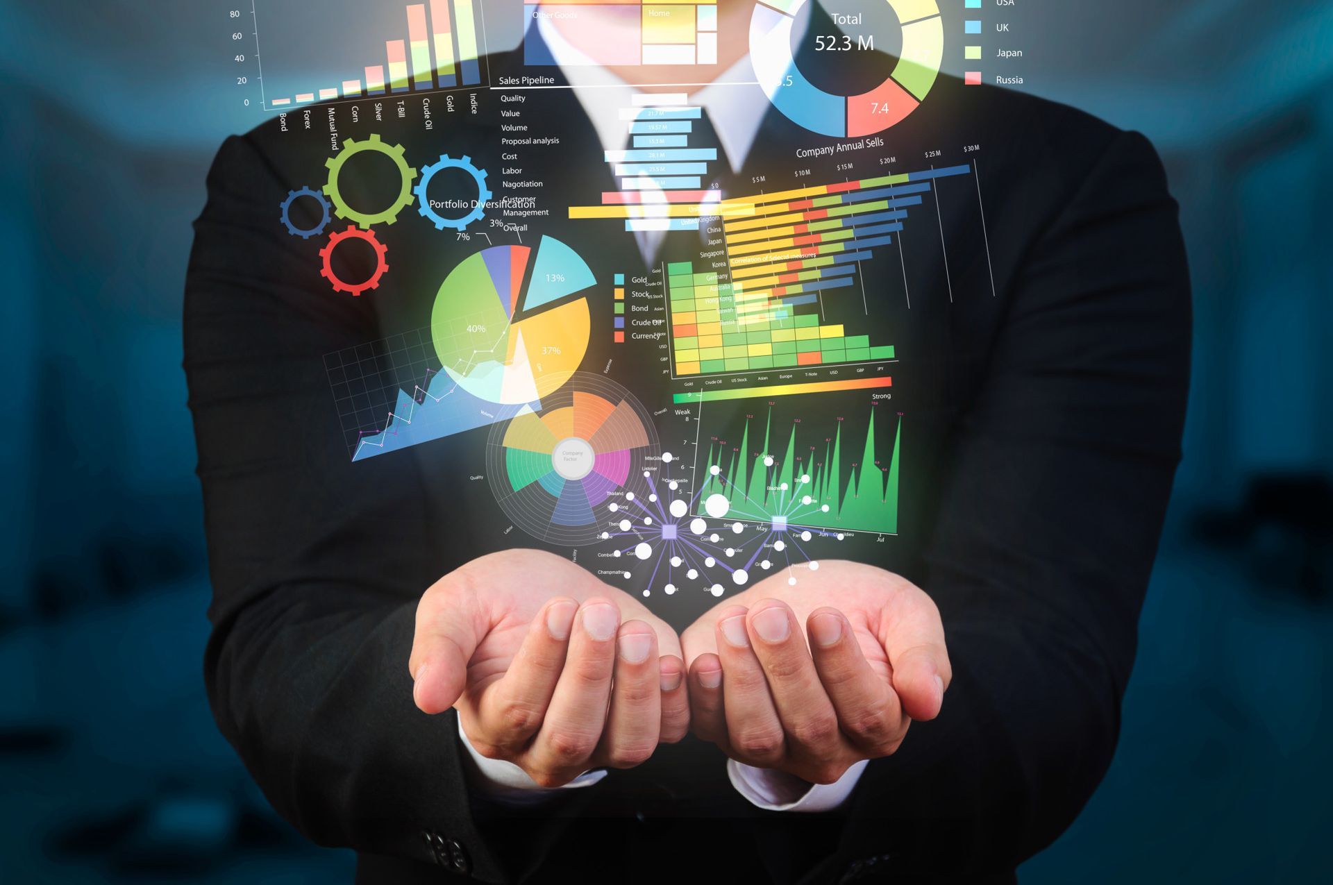 Man in suit holding data visualizations, various charts and graphs, glowing in his hands.