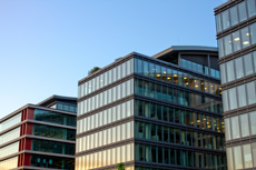 Exterior Photograph Of A Commercial Building With Glass Windows