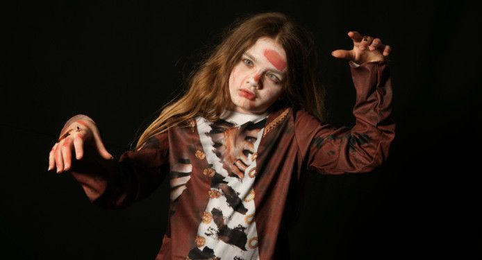 child in costume at a play 