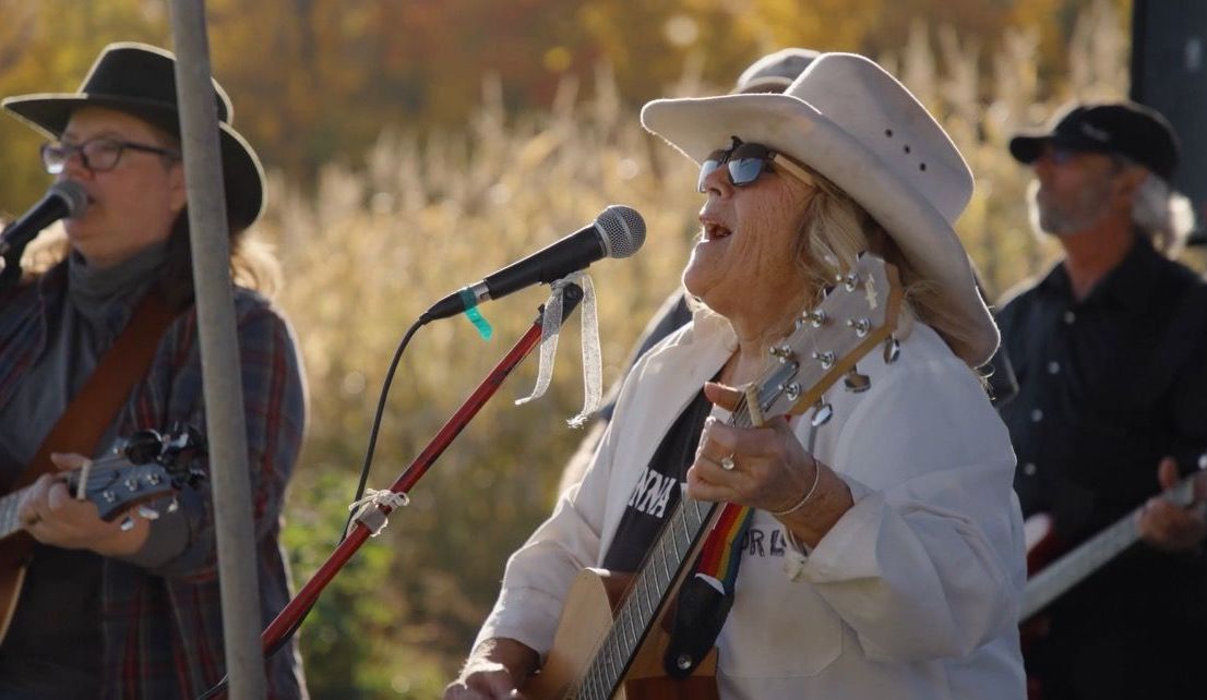 Bluegrass musicians performing outside at isham family farm fall festival 