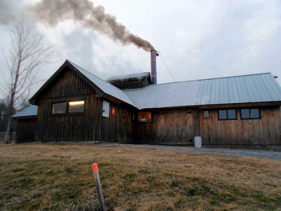 Photo of the isham family farm maple boiling facility on an overcast day