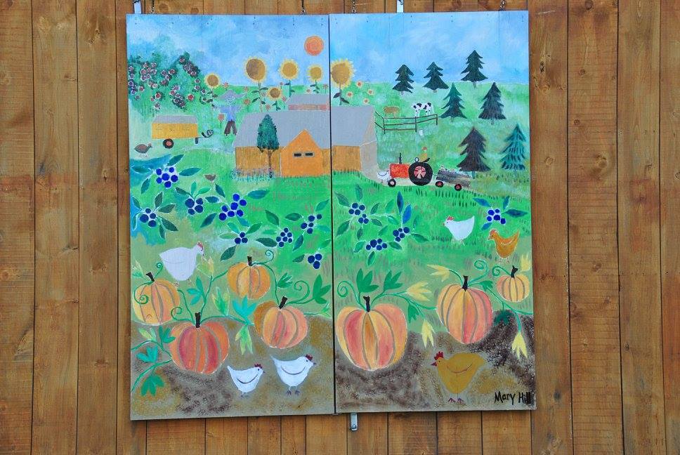 up close photo of a hand painted mural of the isham family farm pumpkin patch