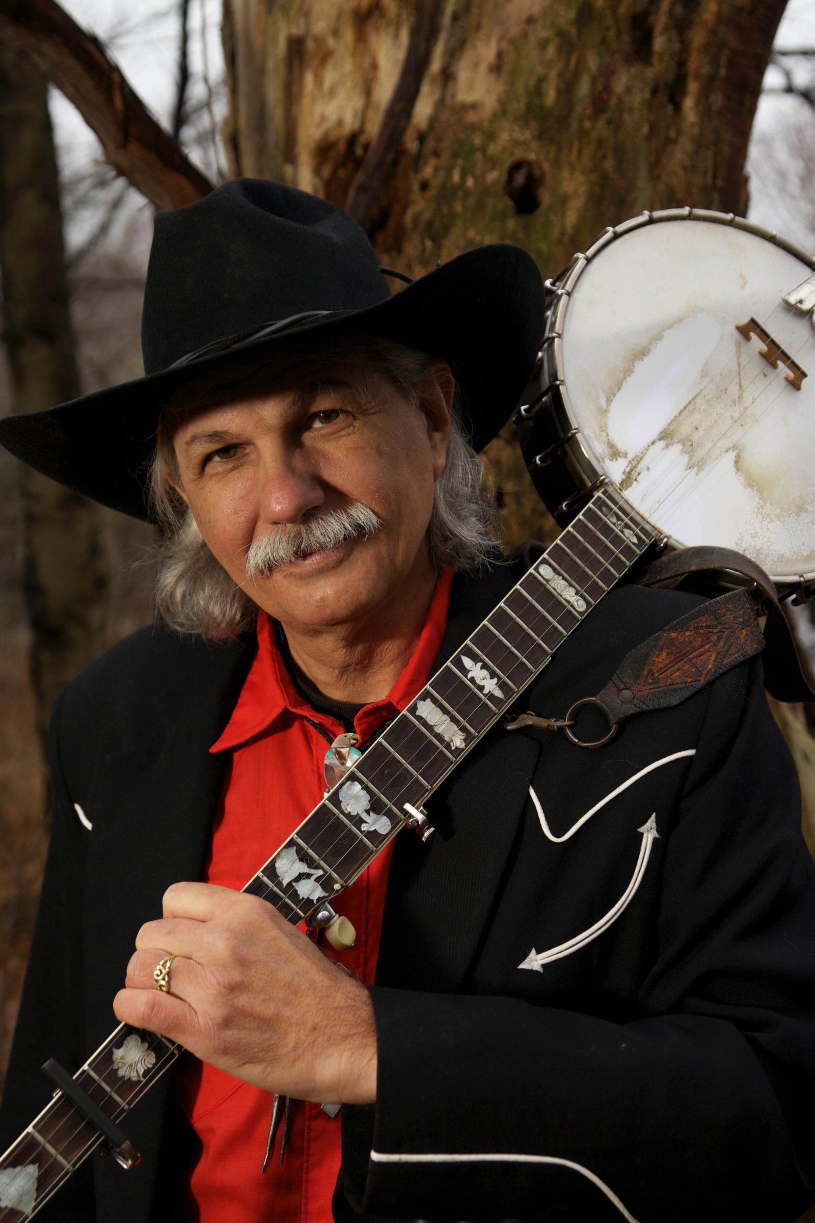 Rik a banjo musician who performs at isham family farm