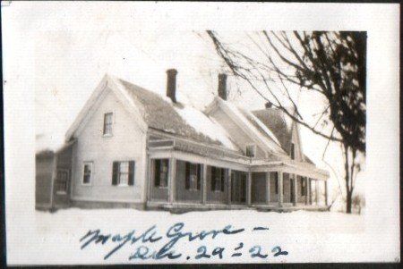 Historic photo of the Isham Family Farmhouse, labeled