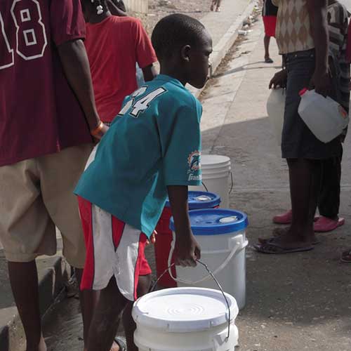 Kid In Line For Water — Traverse City, MI — Berg Well Drilling