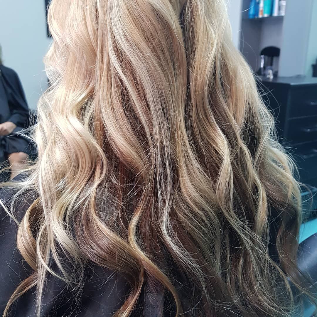 The Back Of A Woman's Head With Long Hair And A Black Shirt — MLB Hair In  Smithfield, QLD