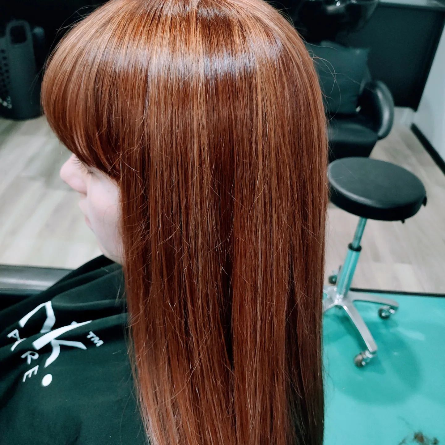 A Close Up Of A Woman's Blonde Hair In Front Of A Mirror — MLB Hair In  Smithfield, QLD