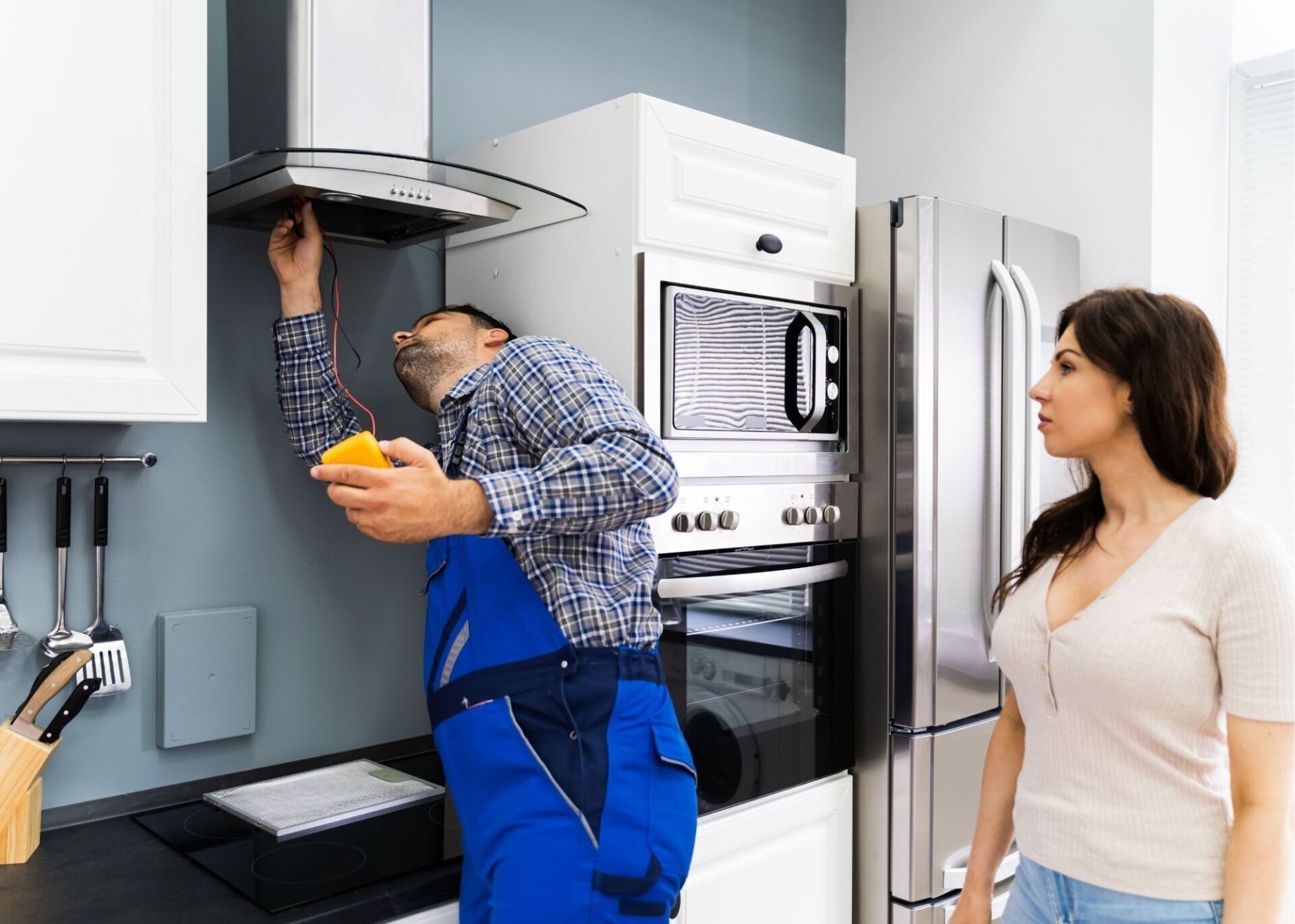 Home Repair Service provider installing a fan