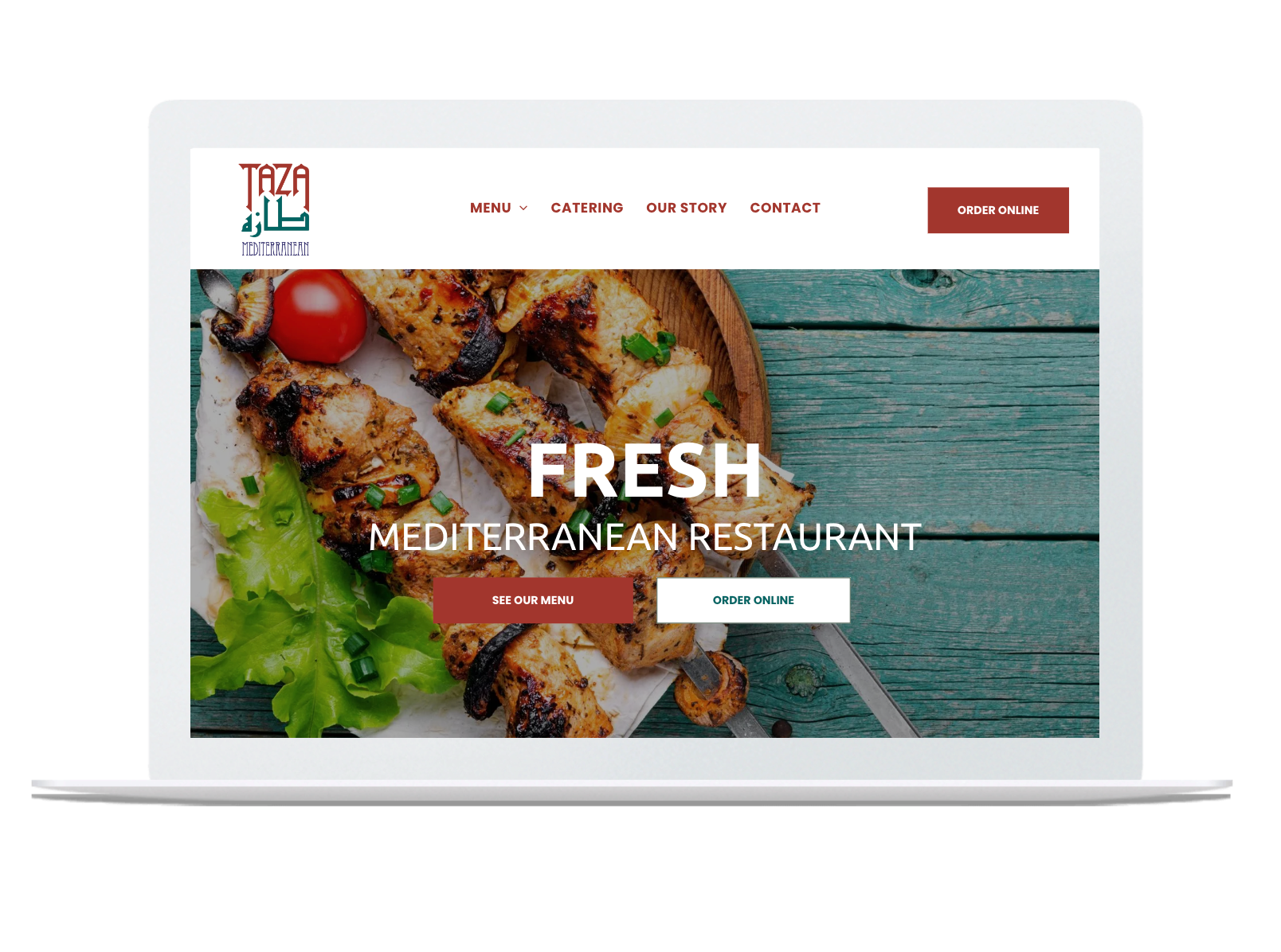 A laptop is open to a website for a mediterranean restaurant.