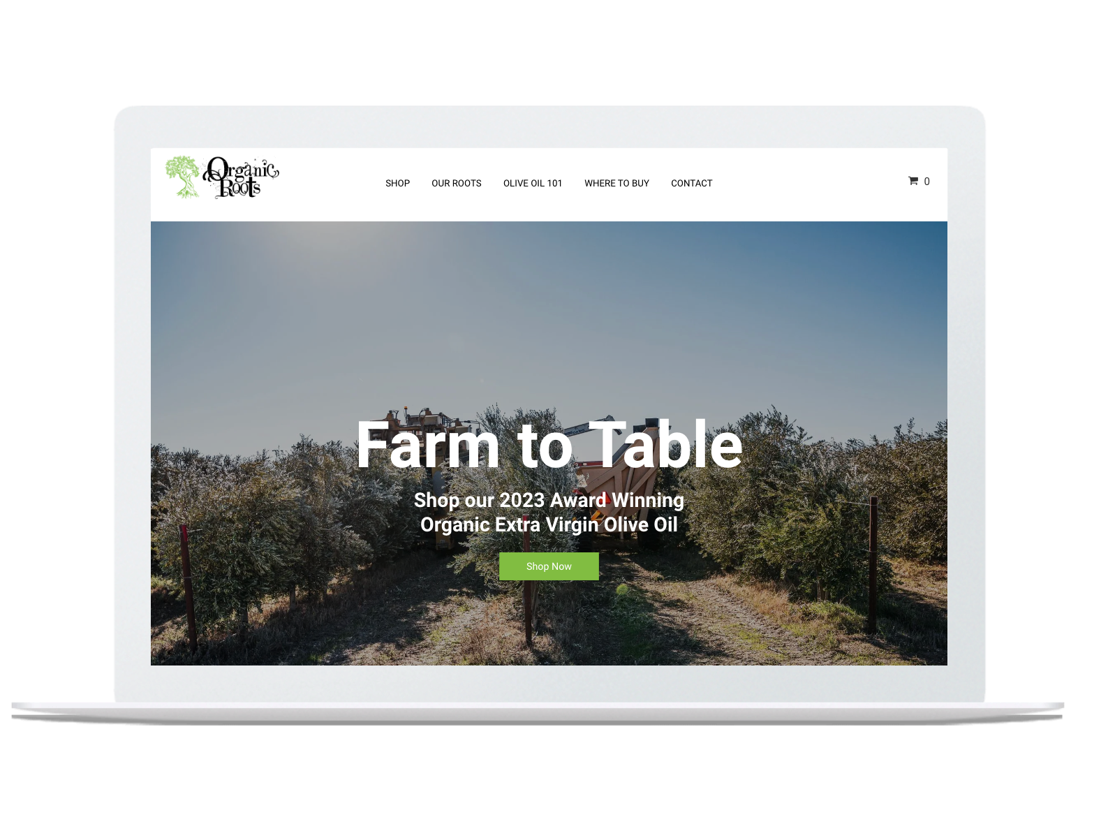 A laptop computer is open to a farm to table website.
