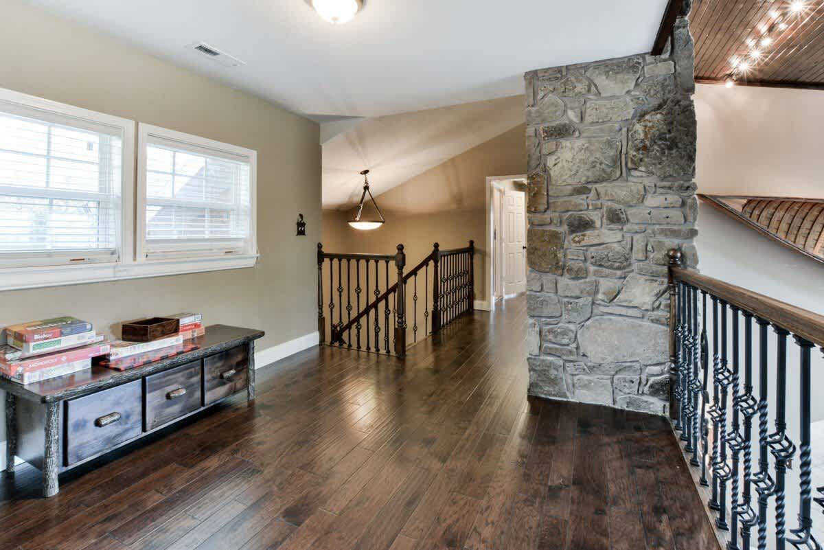 There is a staircase leading up to the second floor of the house.