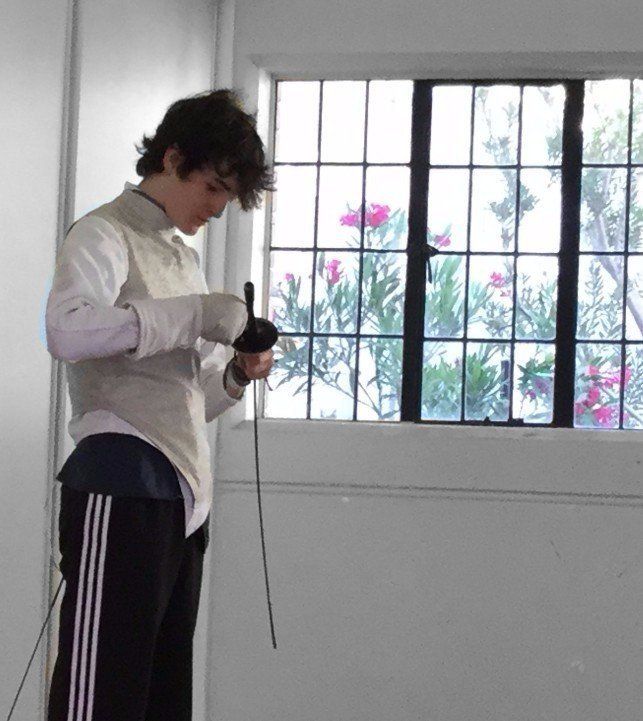 teenage boy fencer beginner foil epee Kew East