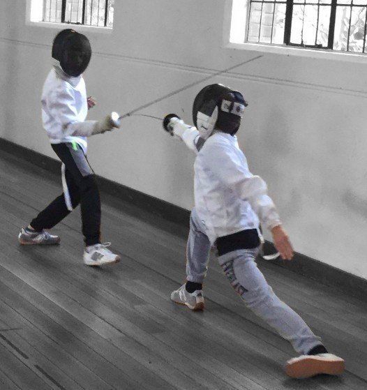 young fencers practicing art of Fencing Kew East