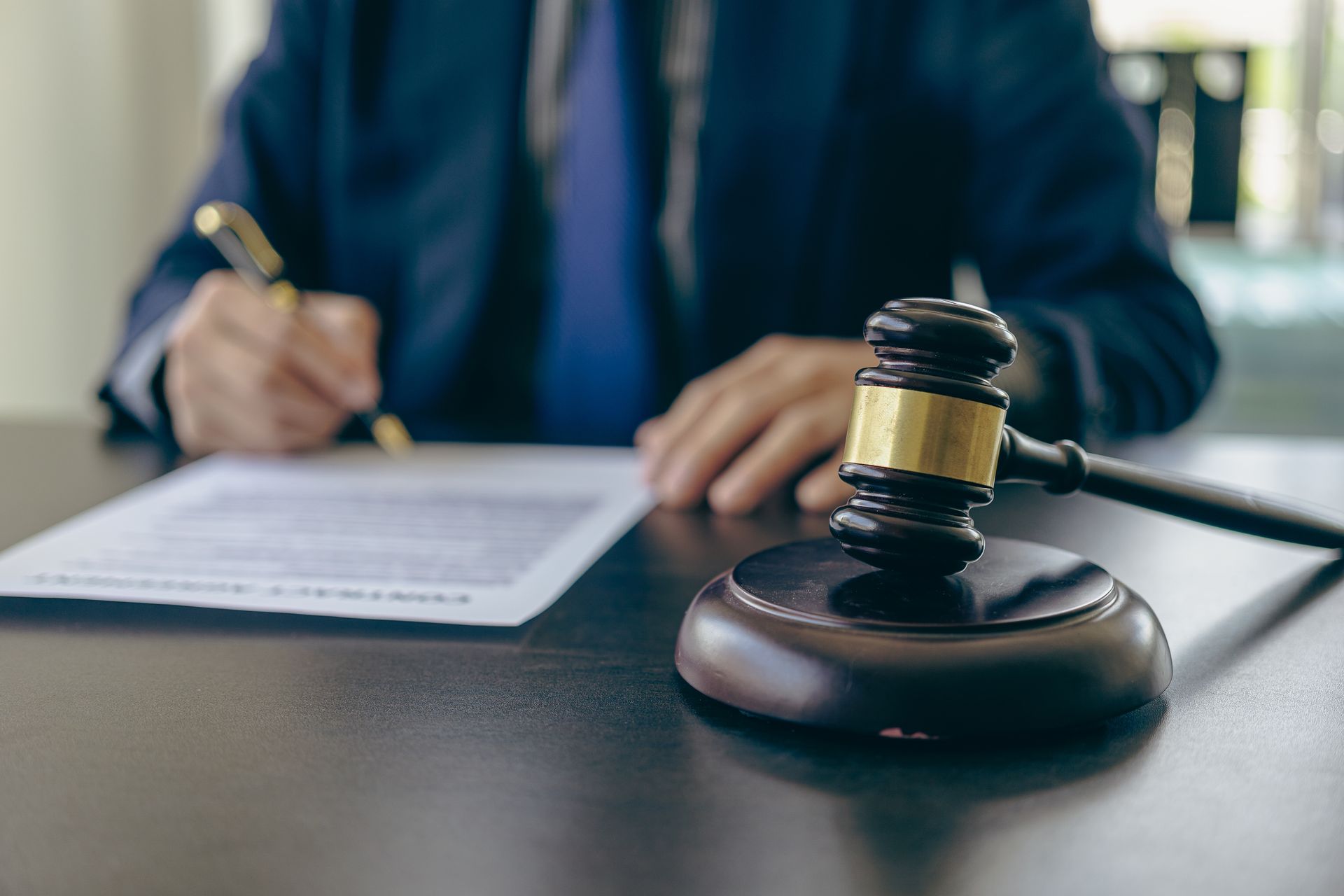 Judge with hammer and scales on table, concept of court and justice, lawyer,
