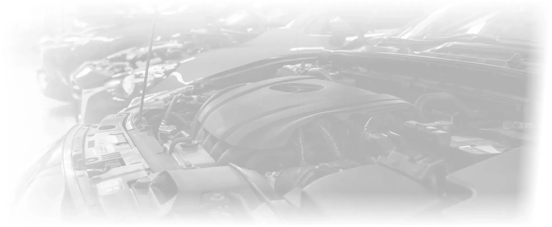 Engine under hood of vehicle White overlay background | Brake Time Auto Repair