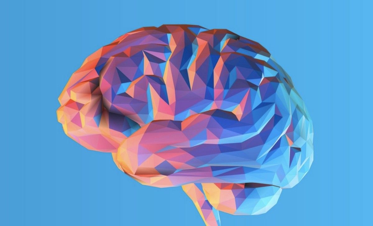 Abstract polygon brain illustration in bright colors symbolizing memory, trauma, and neuroscience research.