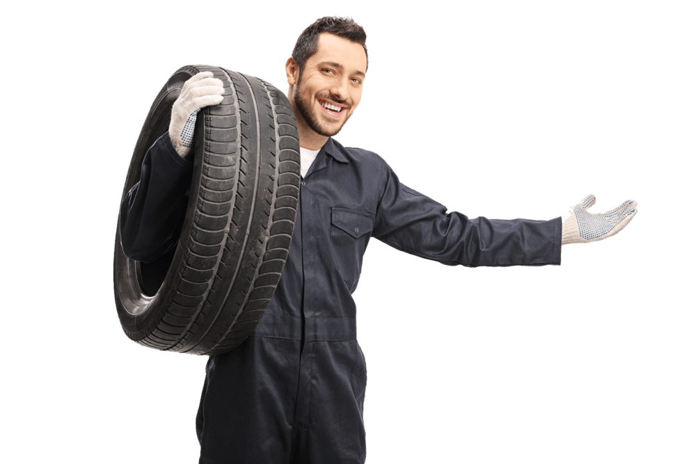 Auto Mechanic With A Tire — Riverdale, IL — L&T Auto Repairs