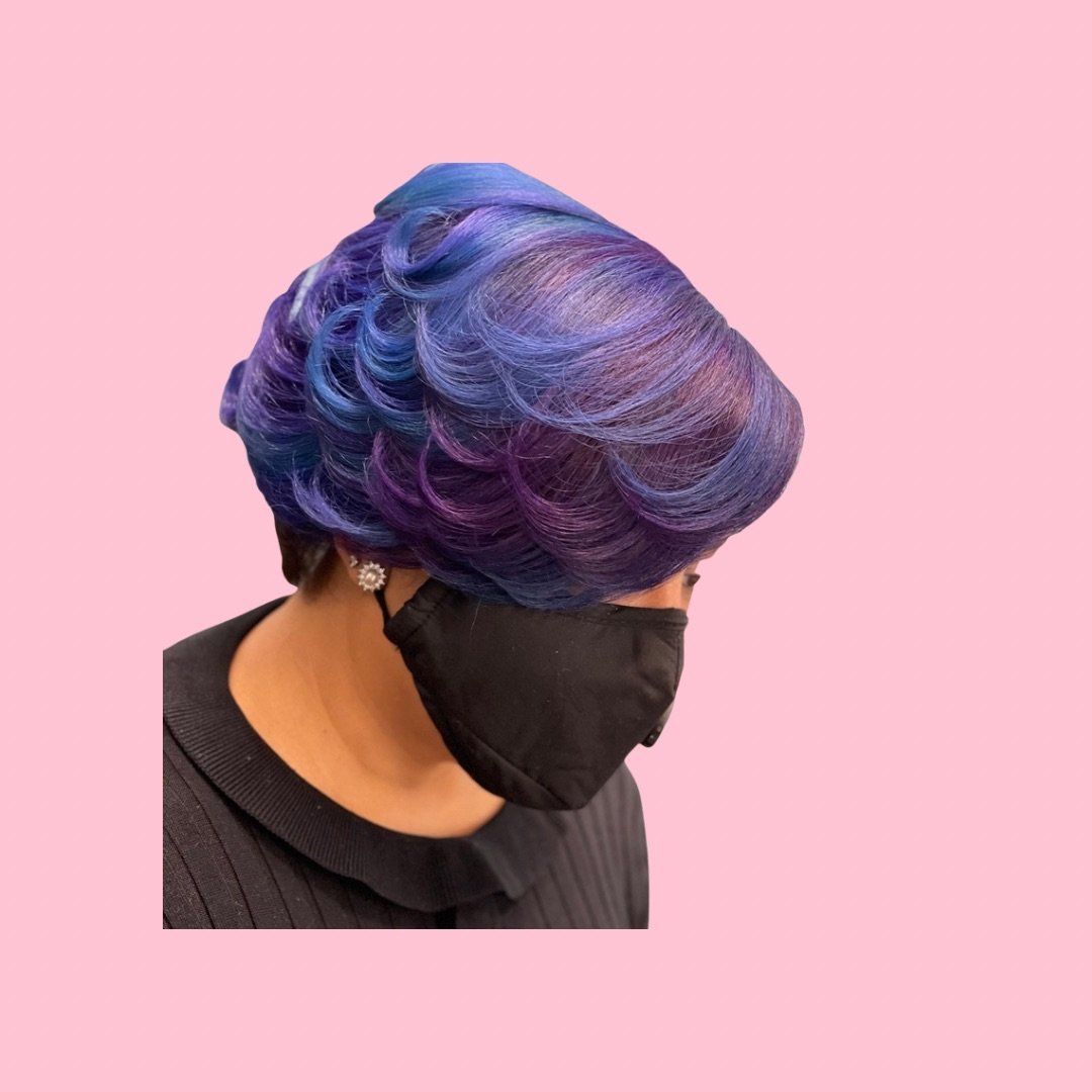 A woman with purple 
