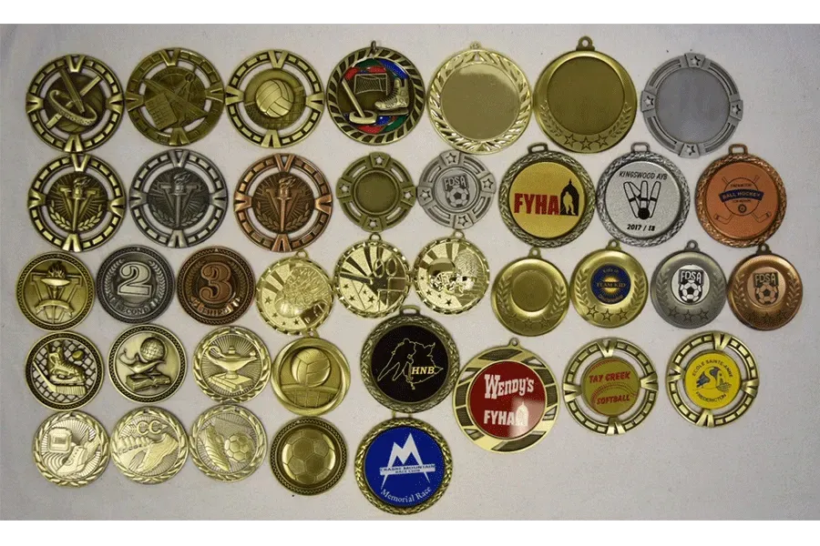 A bunch of medals with one that says final on it