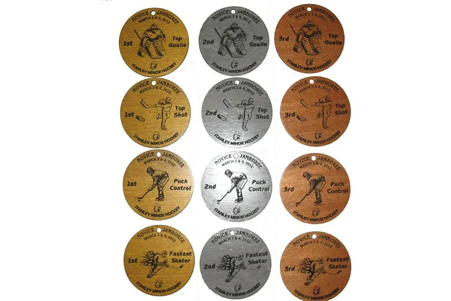 A bunch of coins with a hockey player on them
