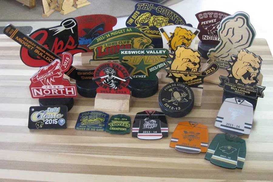 A bunch of stickers on a table including one that says north