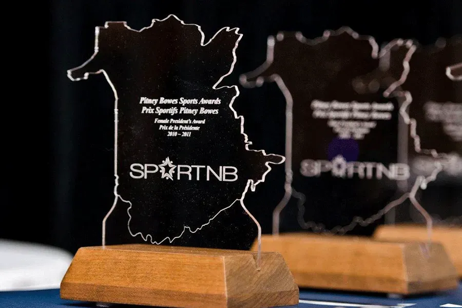 The word sportnb that is on a trophy