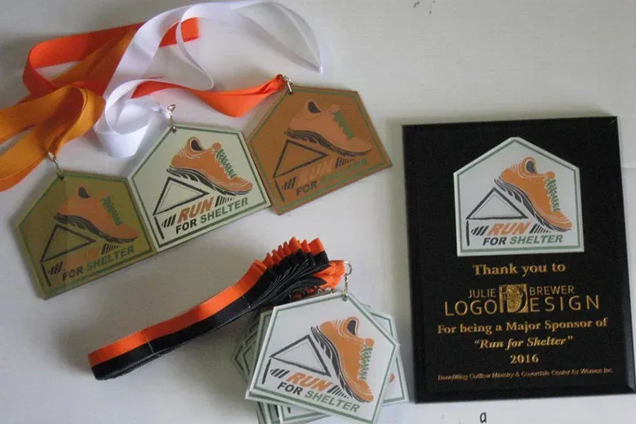 A plaque that says thank you to the finalists logo design