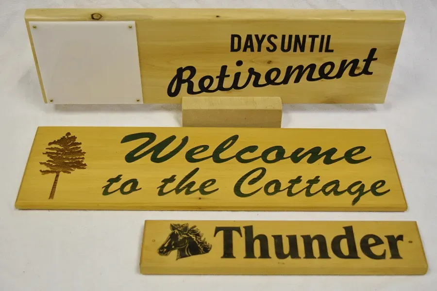 A wooden sign that says days until retirement welcome to the cottage and thunder