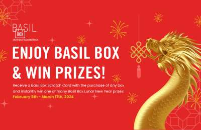 A picture of a dragon on a red background with the words `` enjoy basil box & win prizes ''.